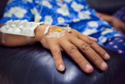 A patient receiving chemotherapy. Image by Chaikom via Shutterstock